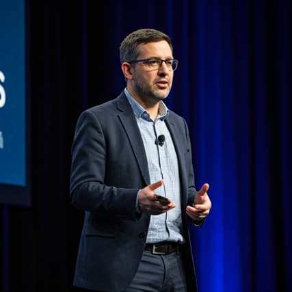 Speaker presenting a research talk